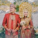 bride-groom-reception-wearing-red-dress_741287-8