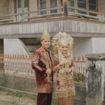 portrait-wedding-couple-happy-day-wearing-red-clothes_741287-15